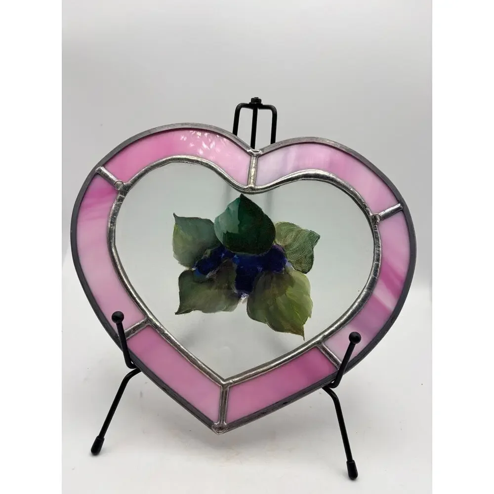 Stained glass heart. With a hand painted floral design.
